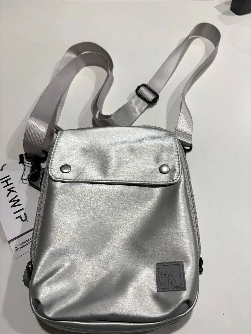 Ikwhip Metallic Matte Silver Everyday Crossbody Bag. Lots of pockets! Web strap